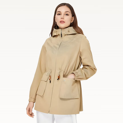 Woman wearing a beige trench coat on a white background